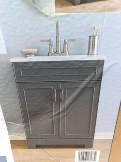New Style selections 24 in Vanity with white marble top