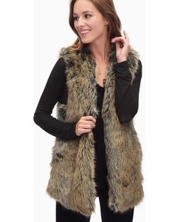 Splendid new with tags fur vest retails for $228