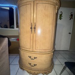 old-style armoire / entertainment cabinet.