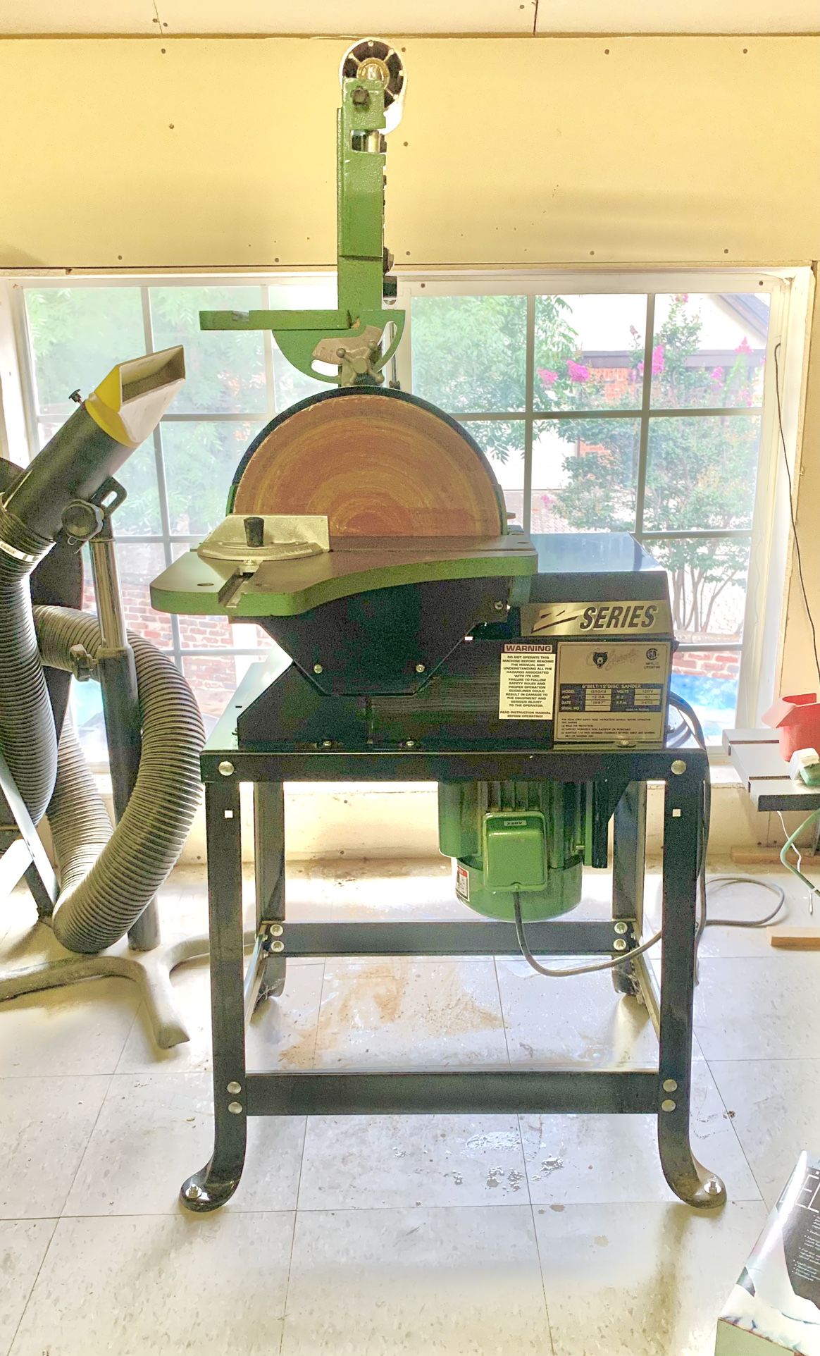 Combination Sander Grizzly on stand G5049 Z Like new private owner rarely used 1-1/2 HP motor 6”x 48” sanding belt Variable speed Roller drive 3450