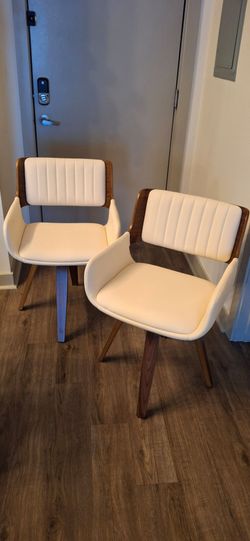Pair of Faux Leather Swivel Chairs