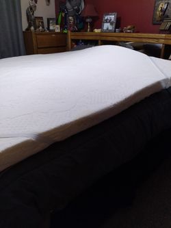 6 month old My Pillow topper.