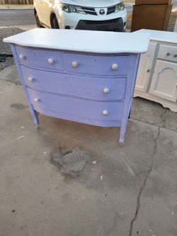 Antique vintage very cool four drawer dresser on wheels easy to roll around built very well high quality solid wood