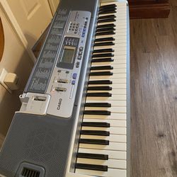Piano Casio LK-100