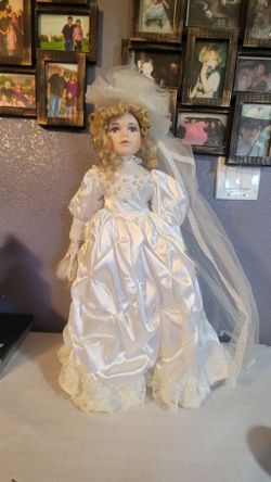 Porcelain Bride Doll Blonde Curly Hair, Blue Eyes, And White Satin and Lace Gown