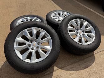20” Chevrolet Silverado silver oem wheels tires