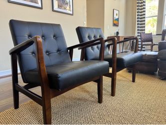 2 black faux leather accent chairs