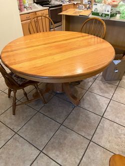Solid Oak Table  Sits 8
