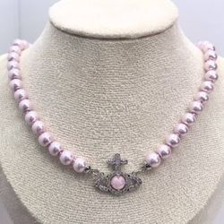 Cross pink pearl necklace