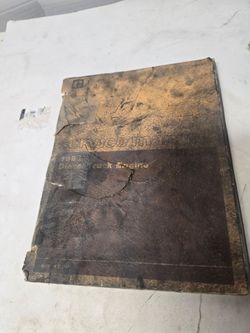 Service Manual" and "1693 Diesel Truck Engine" printed on the cover, bearing the Caterpillar logo.