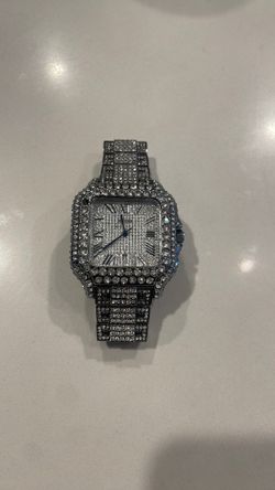 Diamond studded Cartier watch silver