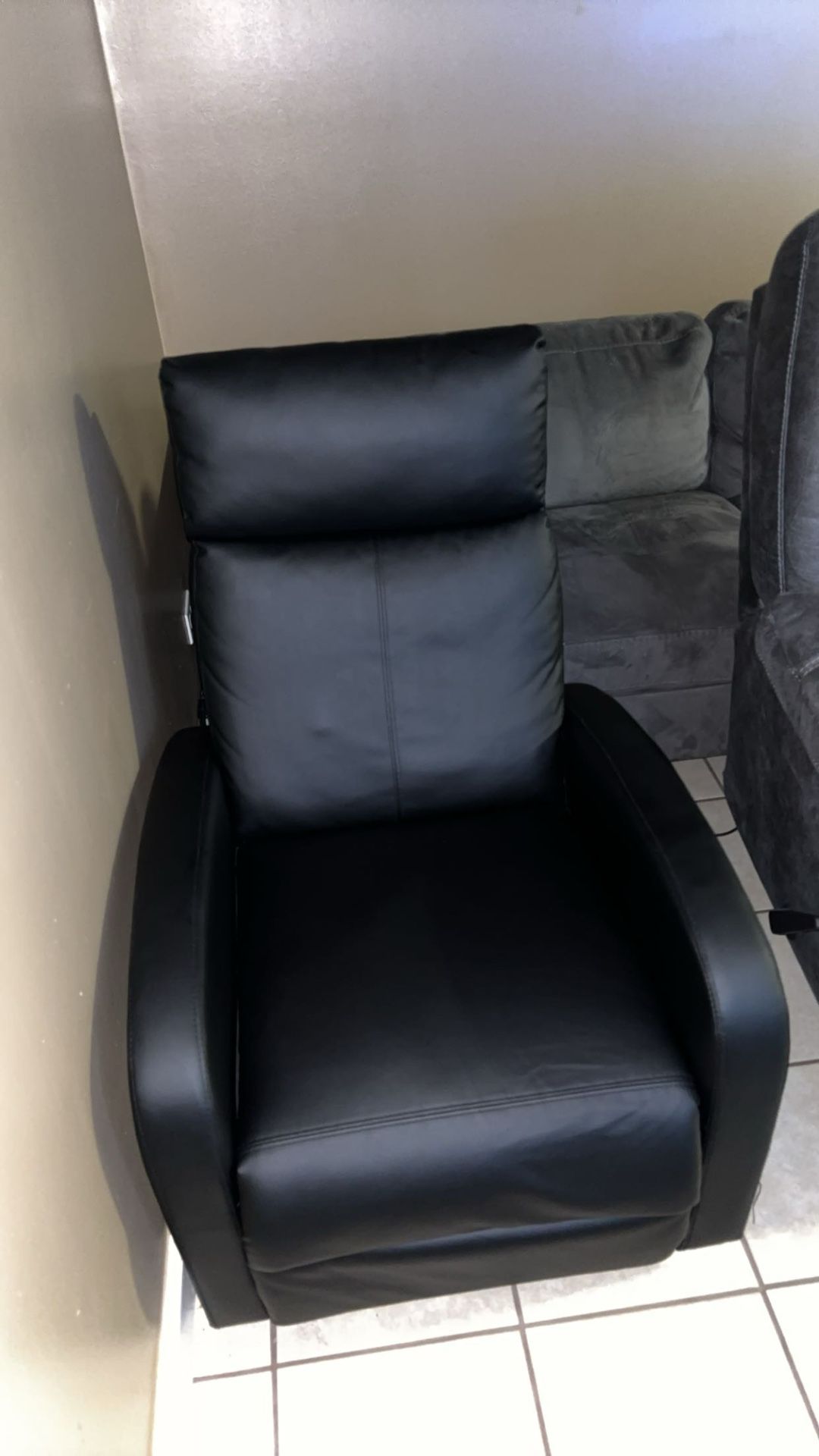 Black reclining massage chair 