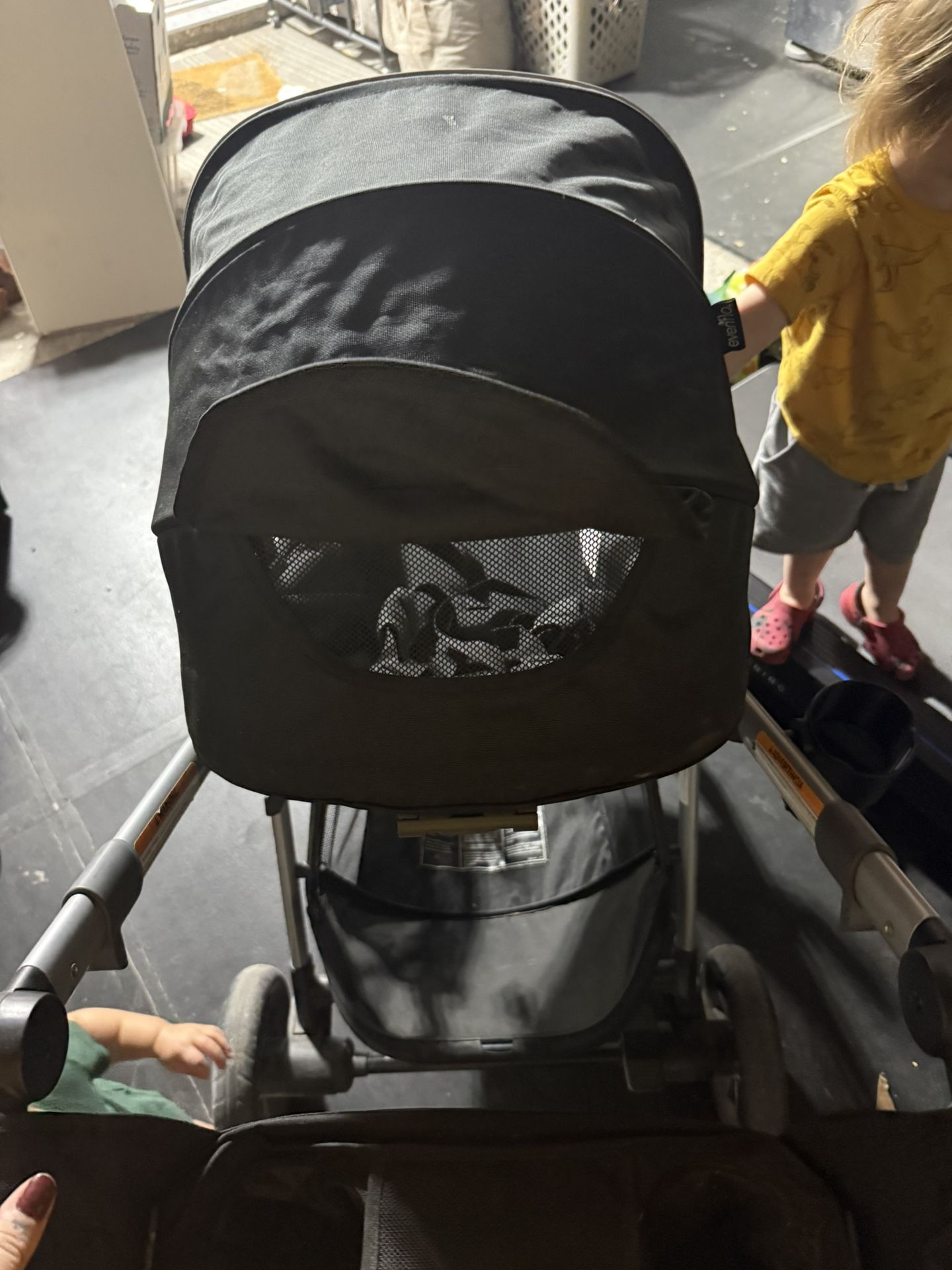 Used Evenflo Pivot Xpand Double Stroller With Car Seat
