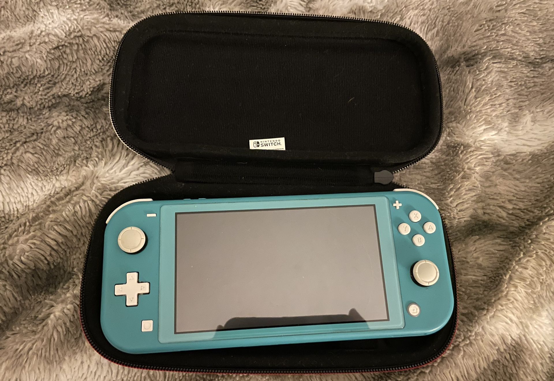 Blue Nintendo Switch Lite + 5 games