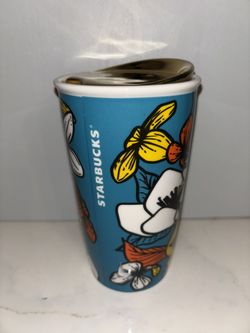 Starbucks 2019 Teal Blue and Poppy Flowers ceramic travel mug. 