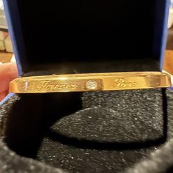 Gold cuff bracelet with “Forever Love” and cubic zirconia