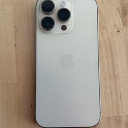 Like New Factory Unlocked iPhone 14 Pro 256GB Gold with Physical SIM and e-SIM.