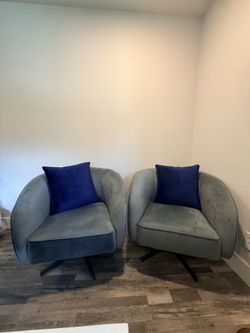Two Swivel Accent Chairs