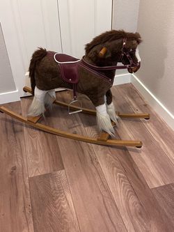 Beautiful like new plush rocking horse
