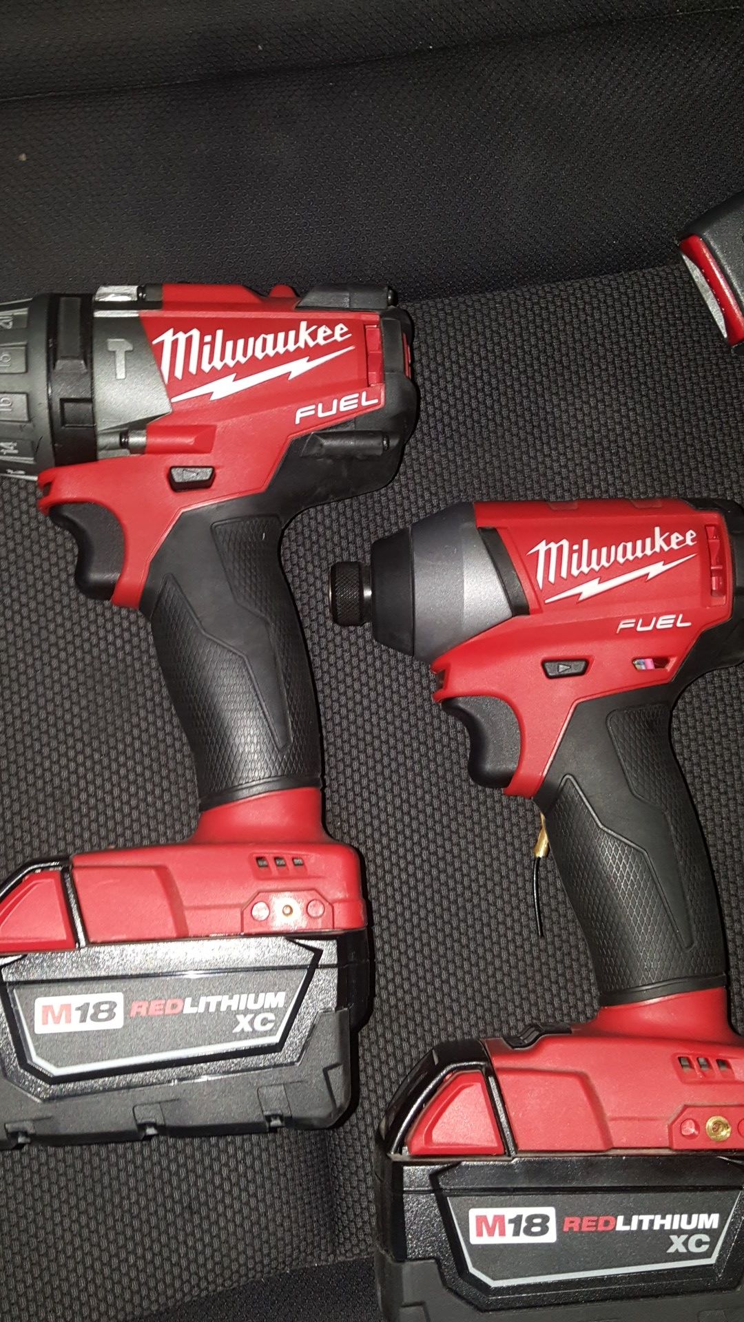 Milwaukee fuel m18 drill driver and impact driver combo with m18 xc batteries