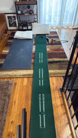 Golf putting mat