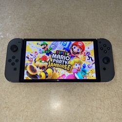 NINTENDO SWITCH OLED MOD with 512GB SD LOADED with 120 SWITCH GAMES + 7000 CLASSIC GAMES