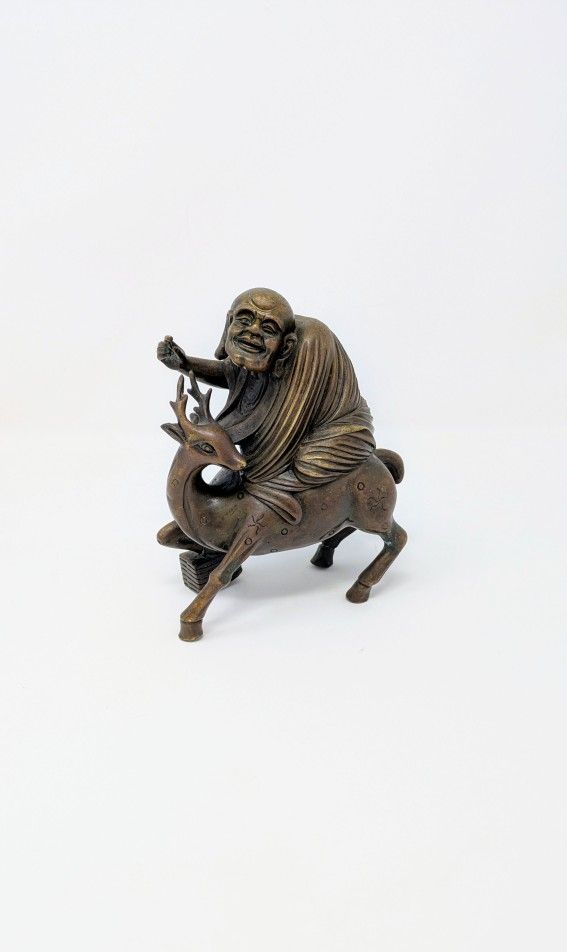 Antique Chinese Bronze Sculpture: Arhat on Deer