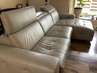 Modern Light Gray leather Power Reclining Sectional Sofa. 10 feet Long. The chaise is 5 1/5 feet