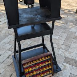 Ryobi 1 3/4" HP Router on table with wheels and 36 bits 