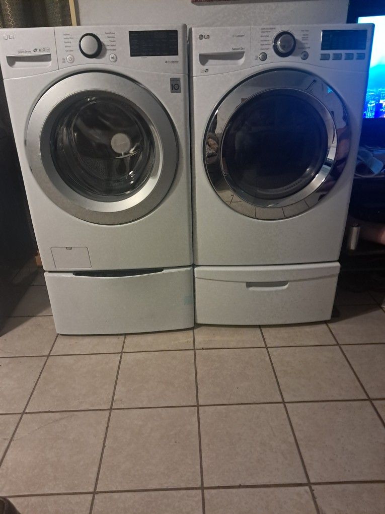LG Front Load Washer And Electric Dryer Set With Sidekick Pedestal Washer  $500