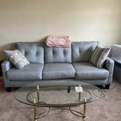 Blue Raymour and Flanigan couch