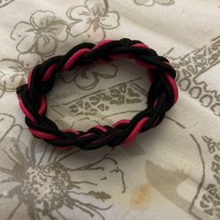 Pink and black woven cord bracelet