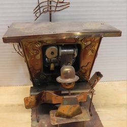 VINTAGE SANKYO WIND-UP MUSICAL METAL SCULPTURE - PIANO MAN - PLAYS THE STING.