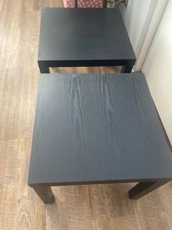Two black end tables