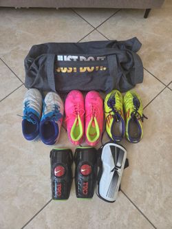 Indoor/Outdoor (3) Soccer Cleats, (2) guards and duffle bag