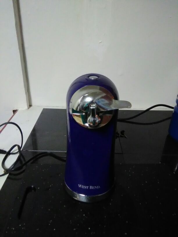 Navy blue electric can opener for Sale in Centralia, WA - OfferUp