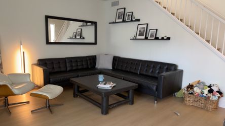 Black Leather Couch and Coffee Table