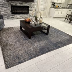 Coffee Table and the Rug  - Surya Amadeo– 9’10” x 12’2” – Excellent Condition