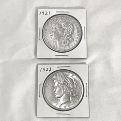 Uncirculated 1921 Morgan & 1922 Piece Silver Dollars. 