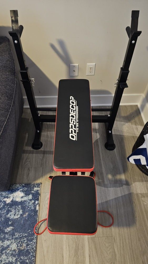 Olympic Bar And Rubber Weights With Bench