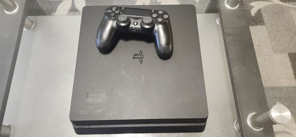 PS4 Slim 500gigs + Controller