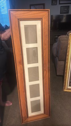 Picture frame that holds 5 pictures