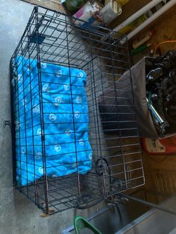 Metal pet cage in good condition