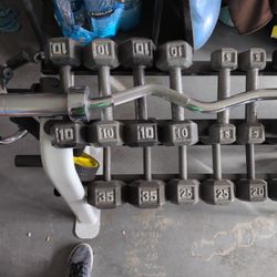 Hex Iron And Rubberized Dumbbells With Rack And Other Accessories  