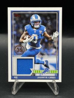 2026 Topps Flagship 1991 35th Anniversary #91TFR-JGIBB Jahmyr Gibbs Player Worn Patch Relic
