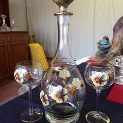 Vintage tall liquor/wine decanter with two matching wine goblets and glass stopper yellow flowers+ gold butterflies and trim 15.5 inches tall A72V443