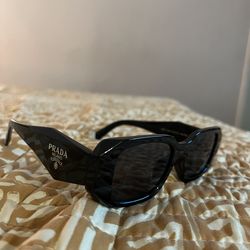 The TRENDY Prada Glasses for just $199