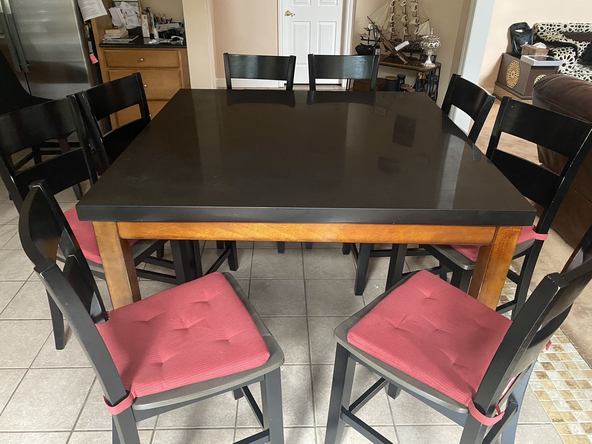 Black Granite Table With 8 Chairs (and Cushions)