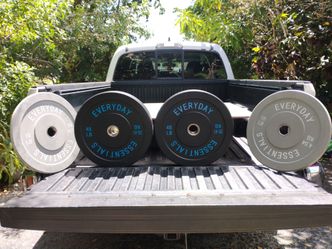 SET  OF  NEW  45LB.  &  10LB.  BUMPER  PLATES
