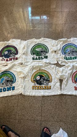 Bundle of women’s NFL crop T-shirts size small all new without tags